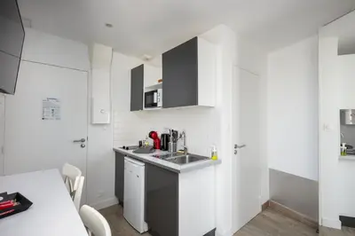 Cuisine ou kitchenette dans l'établissement Le Roz
