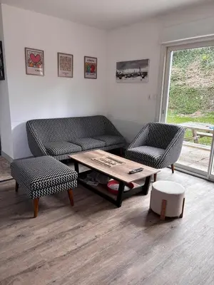 Coin salon dans l'établissement Locquirec Les pieds dans l'eau 6 personnes