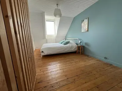 Un ou plusieurs lits dans un hébergement de l'établissement La maison du port