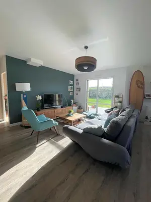 Coin salon dans l'établissement Maison de vacances Loctudy