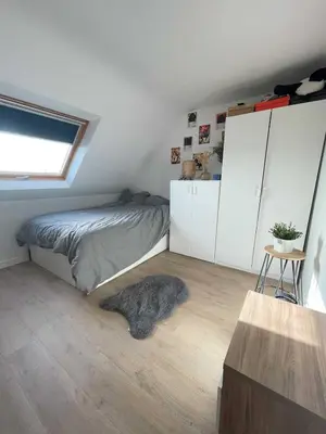 Un ou plusieurs lits dans un hébergement de l'établissement Maison de vacances Loctudy