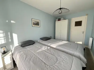 Un ou plusieurs lits dans un hébergement de l'établissement Appartement 2 pièces proche Thalasso Roscoff