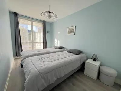 Un ou plusieurs lits dans un hébergement de l'établissement Appartement 2 pièces proche Thalasso Roscoff