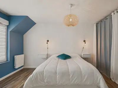 Un ou plusieurs lits dans un hébergement de l'établissement Jolie maison avec jardin et terrasse pour 4