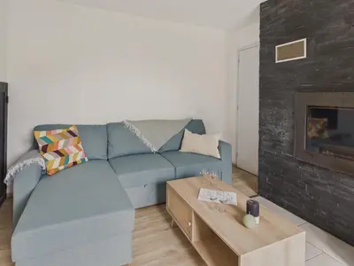 Coin salon dans l'établissement Jolie maison avec jardin et terrasse pour 4