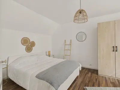Un ou plusieurs lits dans un hébergement de l'établissement Jolie maison avec jardin et terrasse pour 4