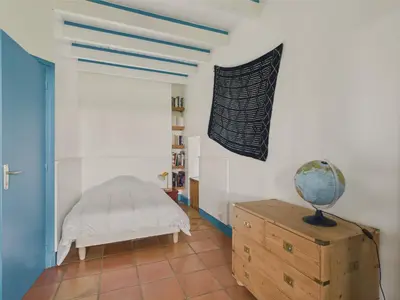 Un ou plusieurs lits dans un hébergement de l'établissement Grande maison vue mer et acces plage direct pour 7