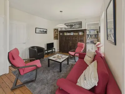 Coin salon dans l'établissement Maison à 30m de la plage - Grand Jardin - pour 6
