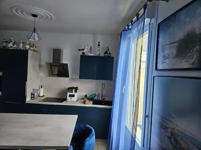 Cuisine ou kitchenette dans l'établissement appartement terrasses poulpatre