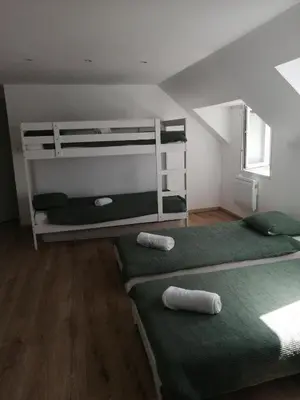 Un ou plusieurs lits dans un hébergement de l'établissement Villa des Agapanthes