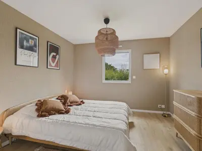 Un ou plusieurs lits dans un hébergement de l'établissement Maison neuve avec terrasse et jardin pour 6
