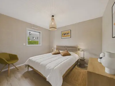Un ou plusieurs lits dans un hébergement de l'établissement Maison neuve avec terrasse et jardin pour 6
