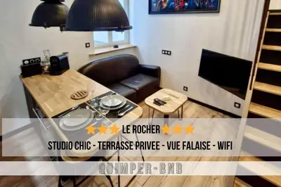 Télévision ou salle de divertissement dans l'établissement Studio Chic avec Terrasse Privée et Vue Falaise