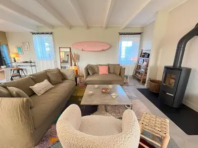 Coin salon dans l'établissement Maison de famille Ty Pampa