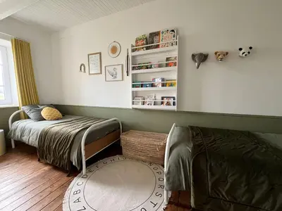 Un ou plusieurs lits dans un hébergement de l'établissement Maison de famille Ty Pampa