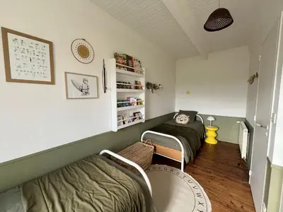 Coin salon dans l'établissement Maison de famille Ty Pampa