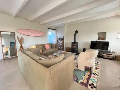 Télévision ou salle de divertissement dans l'établissement Maison de famille Ty Pampa
