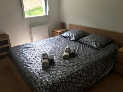 Un ou plusieurs lits dans un hébergement de l'établissement Maison avec spa