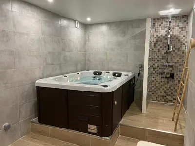 Salle de bains dans l'établissement Maison avec spa
