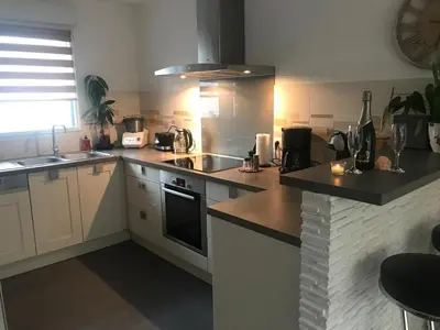 Cuisine ou kitchenette dans l'établissement Maison avec spa