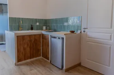 Cuisine ou kitchenette dans l'établissement Chambres d'hôtes - Evasion Bretonne