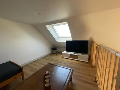 Télévision ou salle de divertissement dans l'établissement Ty Coz
