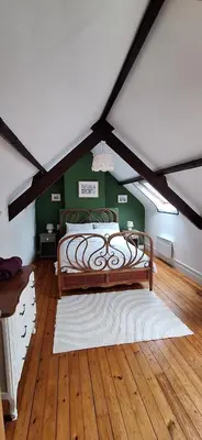 Un ou plusieurs lits dans un hébergement de l'établissement Stang Korvenn - Gîte du Vert Rivage