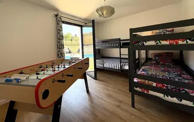 Un ou plusieurs lits dans un hébergement de l'établissement Villa Au Rythme Des Marées
