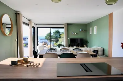 Télévision ou salle de divertissement dans l'établissement Villa Au Rythme Des Marées