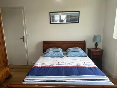 Un ou plusieurs lits dans un hébergement de l'établissement Maison spacieuse et lumineuse à seulement 1 minute de la mer