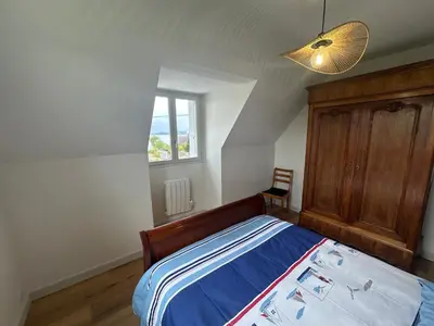 Un ou plusieurs lits dans un hébergement de l'établissement Maison spacieuse et lumineuse à seulement 1 minute de la mer
