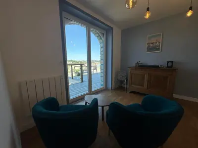 Coin salon dans l'établissement Maison spacieuse Morgat Vue mer imprenable 5 chambres, terrasse XXL