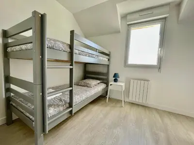 Un ou plusieurs lits dans un hébergement de l'établissement Gîte Clapo'ty
