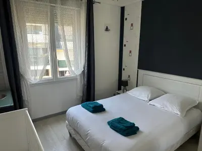 Un ou plusieurs lits dans un hébergement de l'établissement Maison familiale à Morgat, jardin clos, à 2 minutes de la plage