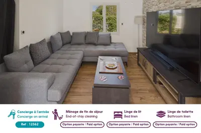 Coin salon dans l'établissement Piscine, jacuzzi et grande terrasse pour 7