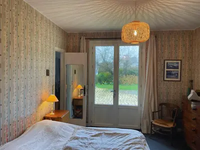 Un ou plusieurs lits dans un hébergement de l'établissement Grande maison face à l'océan avec jardin pour 12