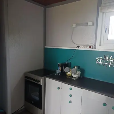 Cuisine ou kitchenette dans l'établissement Chalet Lestraouen