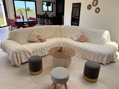 Coin salon dans l'établissement Maison neuve 4 chambres