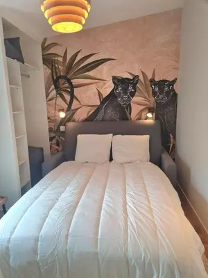 Un ou plusieurs lits dans un hébergement de l'établissement Charmant appartement face au port de Concarneau