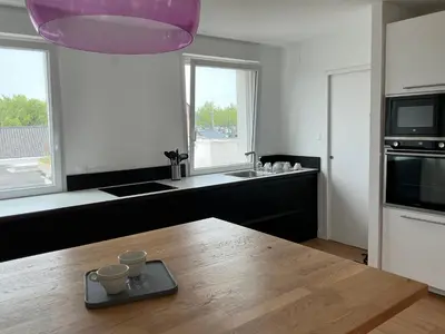 Cuisine ou kitchenette dans l'établissement Lumineux