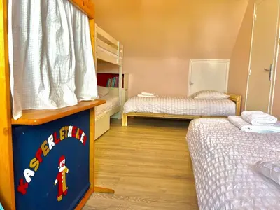 Un ou plusieurs lits dans un hébergement de l'établissement Ma Zi Bihan - maison familiale