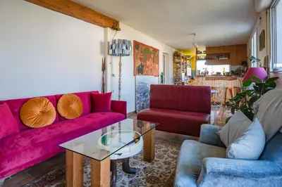 Coin salon dans l'établissement Cozy village house