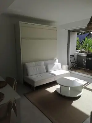 Coin salon dans l'établissement Studio 150 m de la plage