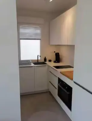 Cuisine ou kitchenette dans l'établissement Studio 150 m de la plage