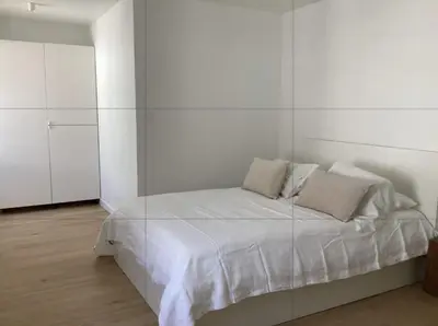 Un ou plusieurs lits dans un hébergement de l'établissement En BORD de MER Au coeur de la station Joli Duplex tout équipé