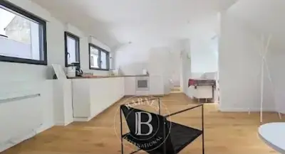 Cuisine ou kitchenette dans l'établissement En BORD de MER Au coeur de la station Joli Duplex tout équipé