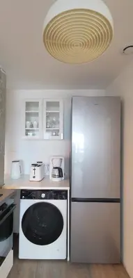 Cuisine ou kitchenette dans l'établissement T1 vue mer roscoff et île de Batz, 2 min à pied de la plage,