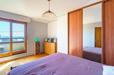 Un ou plusieurs lits dans un hébergement de l'établissement La Villa des Vagues - vue mer proche de la plage