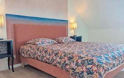 Un ou plusieurs lits dans un hébergement de l'établissement Villa Leonic - Piscine et Jacuzzi