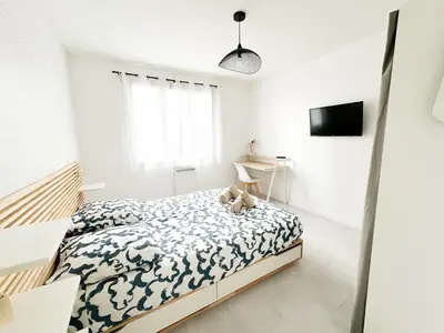 Un ou plusieurs lits dans un hébergement de l'établissement COLIVING - WIFI - TV - Proche TRAM - L'ESCALE PARTAGEE